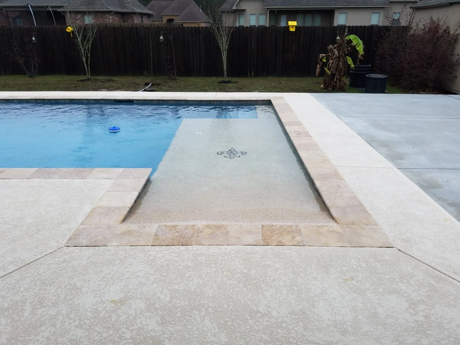 pool and hot tub with decking