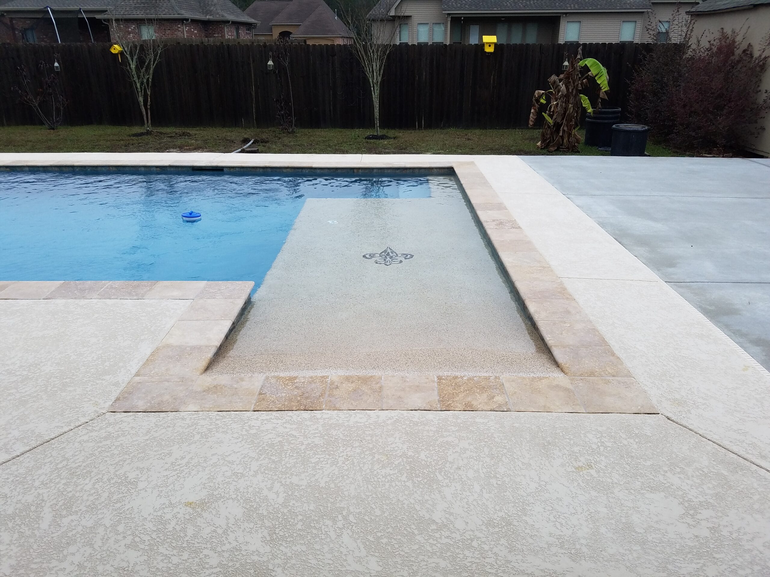 pool and hot tub with decking